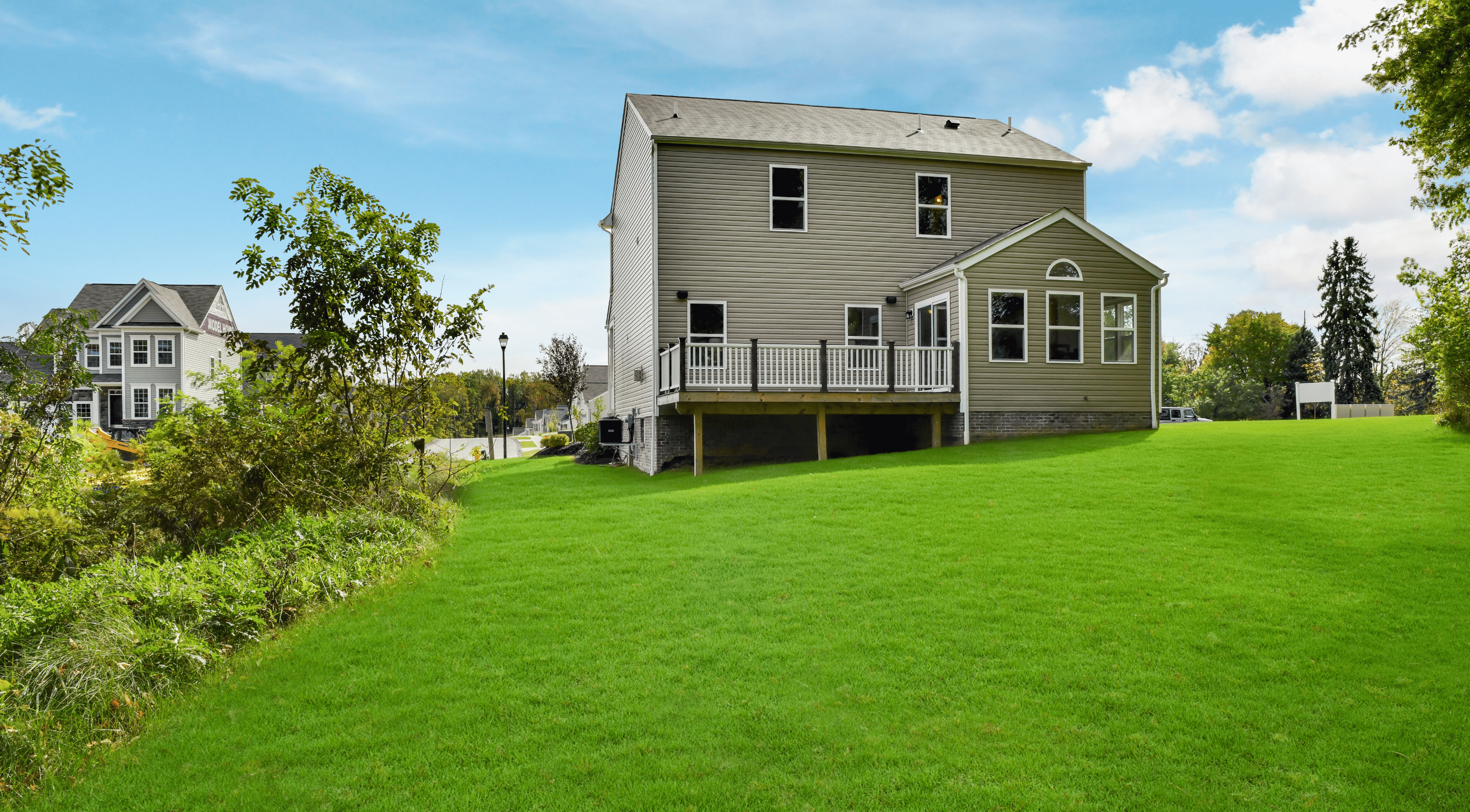 back exterior of a new home in lebanon, oh with a flat backyard