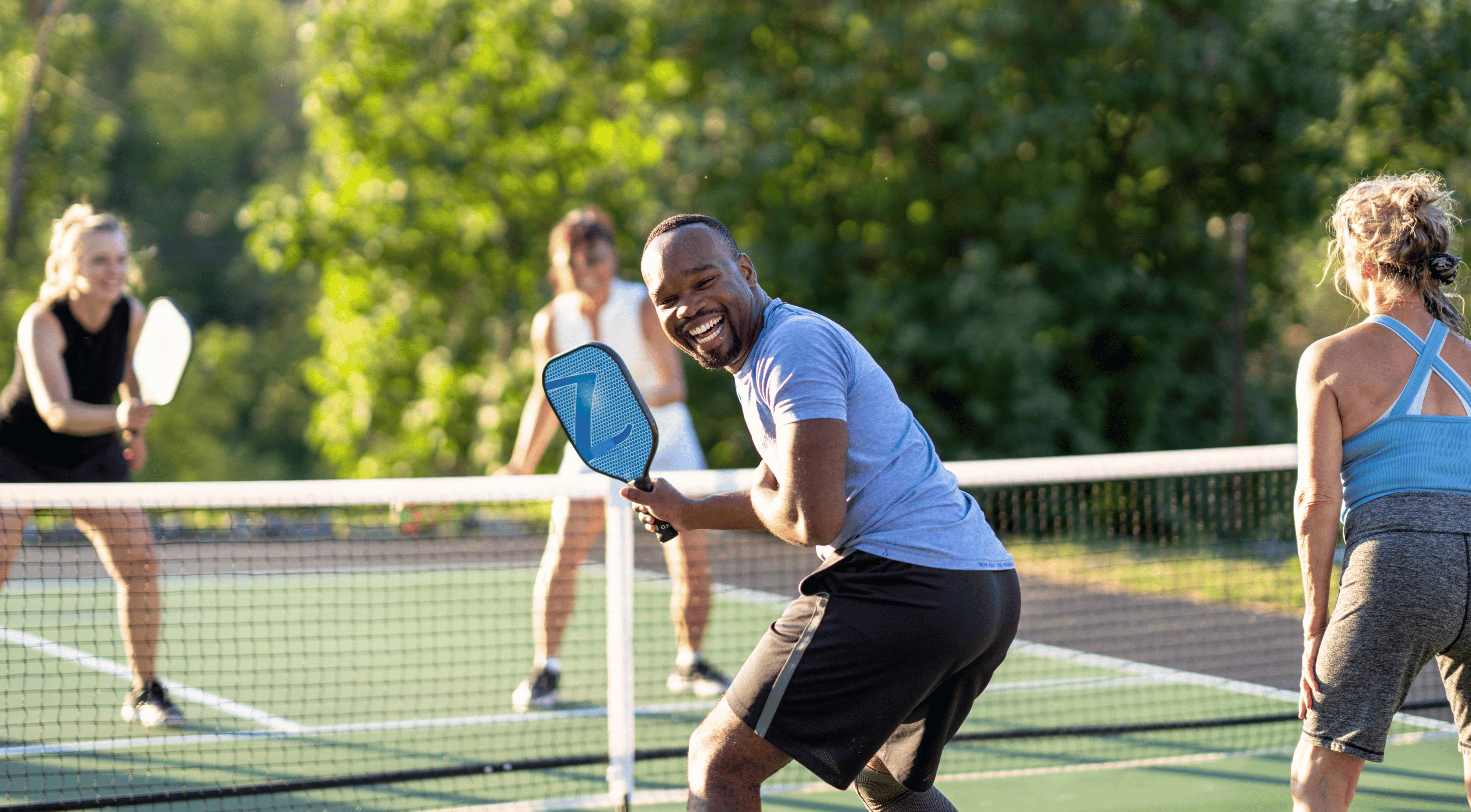 four friends playing pickleball near lebanon, oh