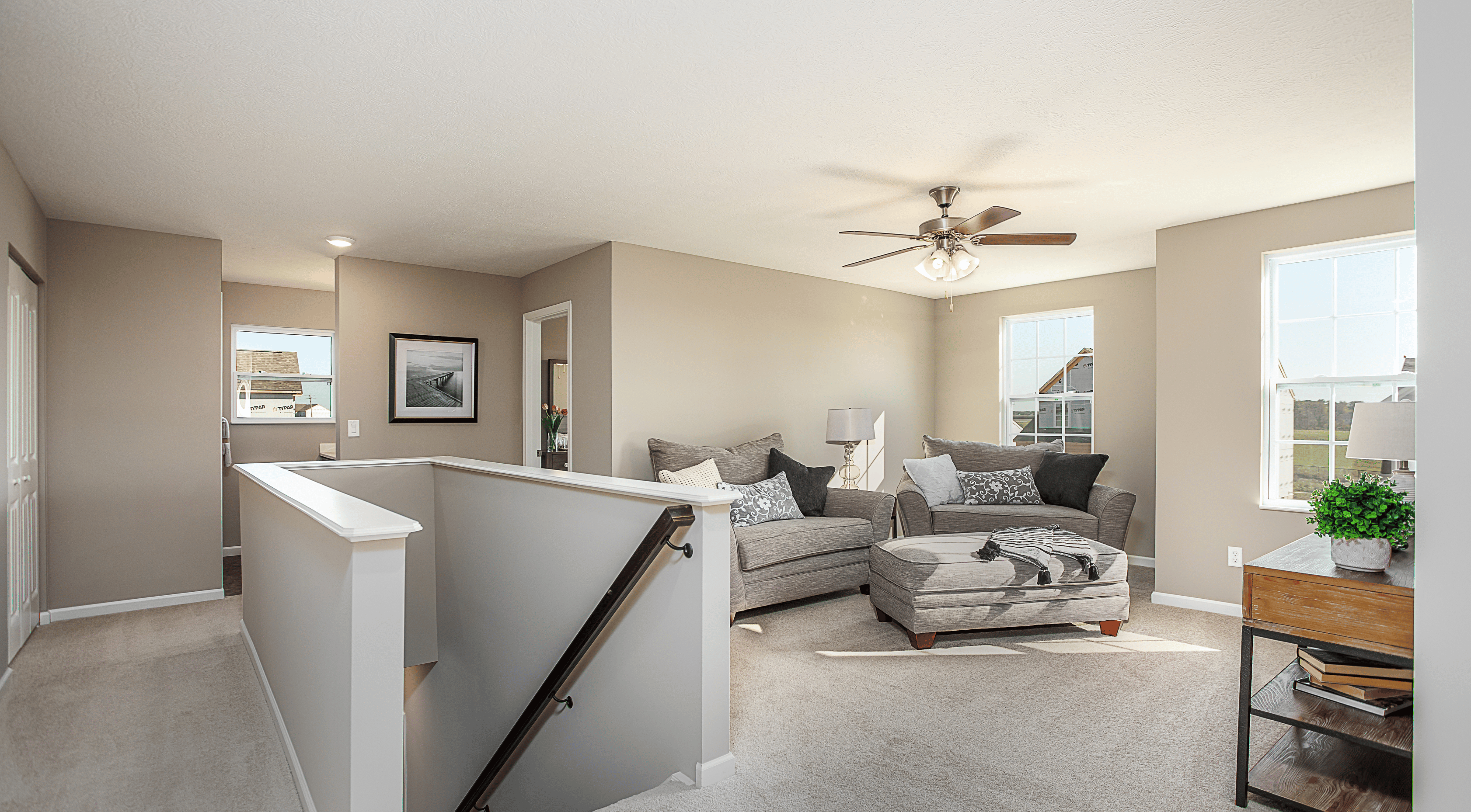 second floor loft area being used as a seating area in a new home in lebanon, oh