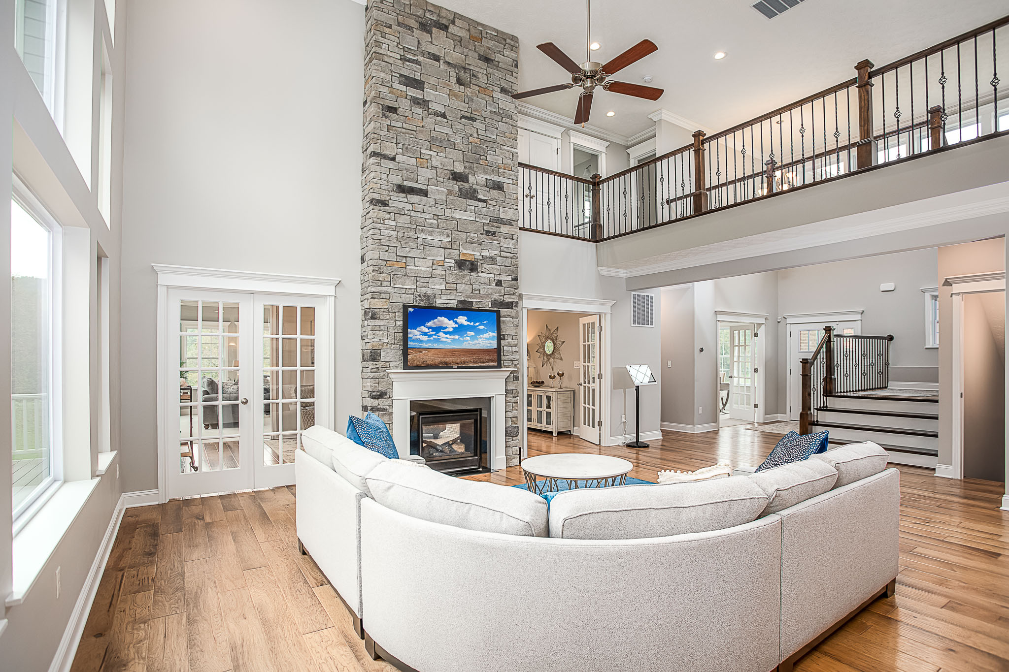 Livingroom with stone fireplace in a new home in Pittsburgh, PA