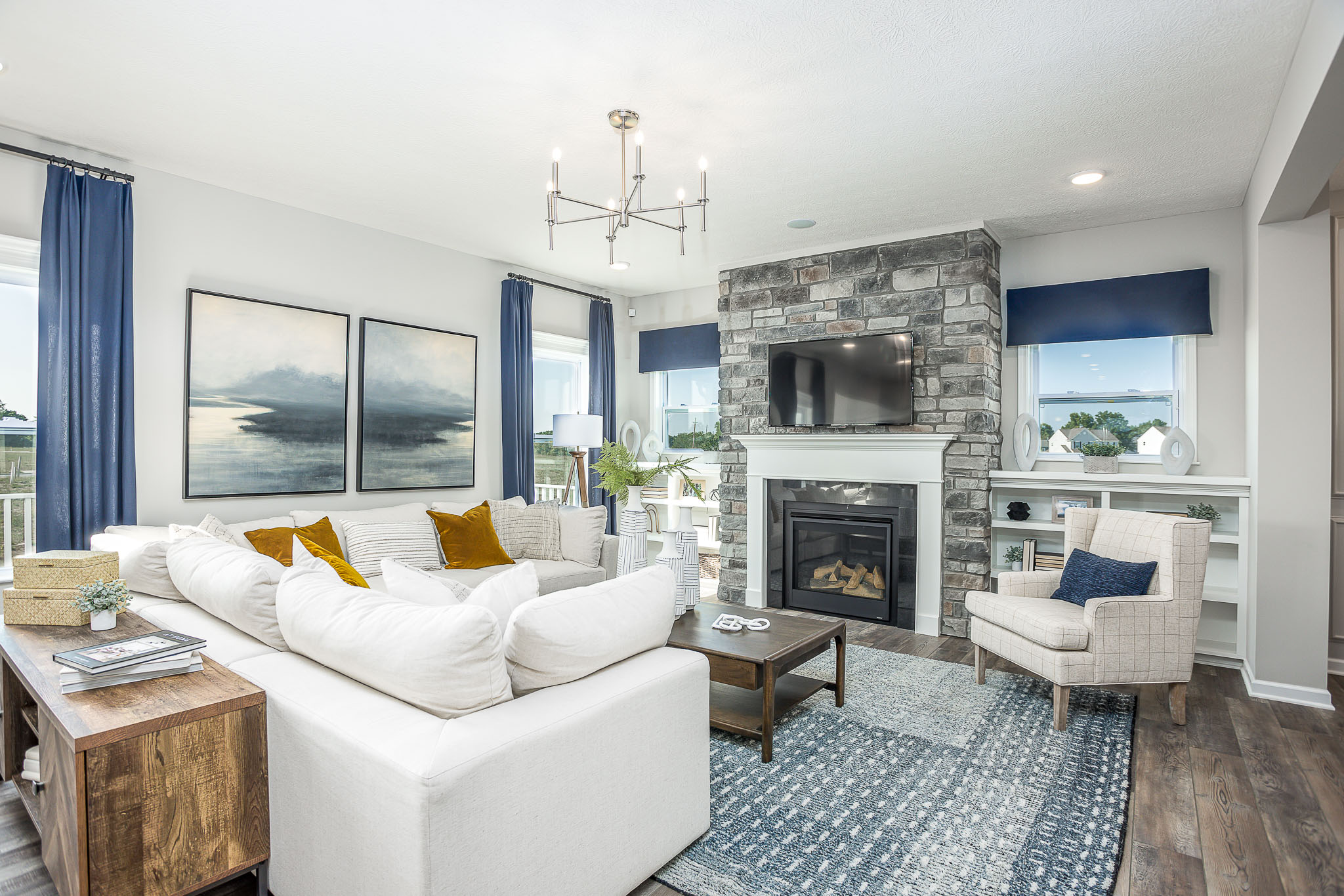 Coastal livingroom with stone fireplace in Westmoreland County, PA