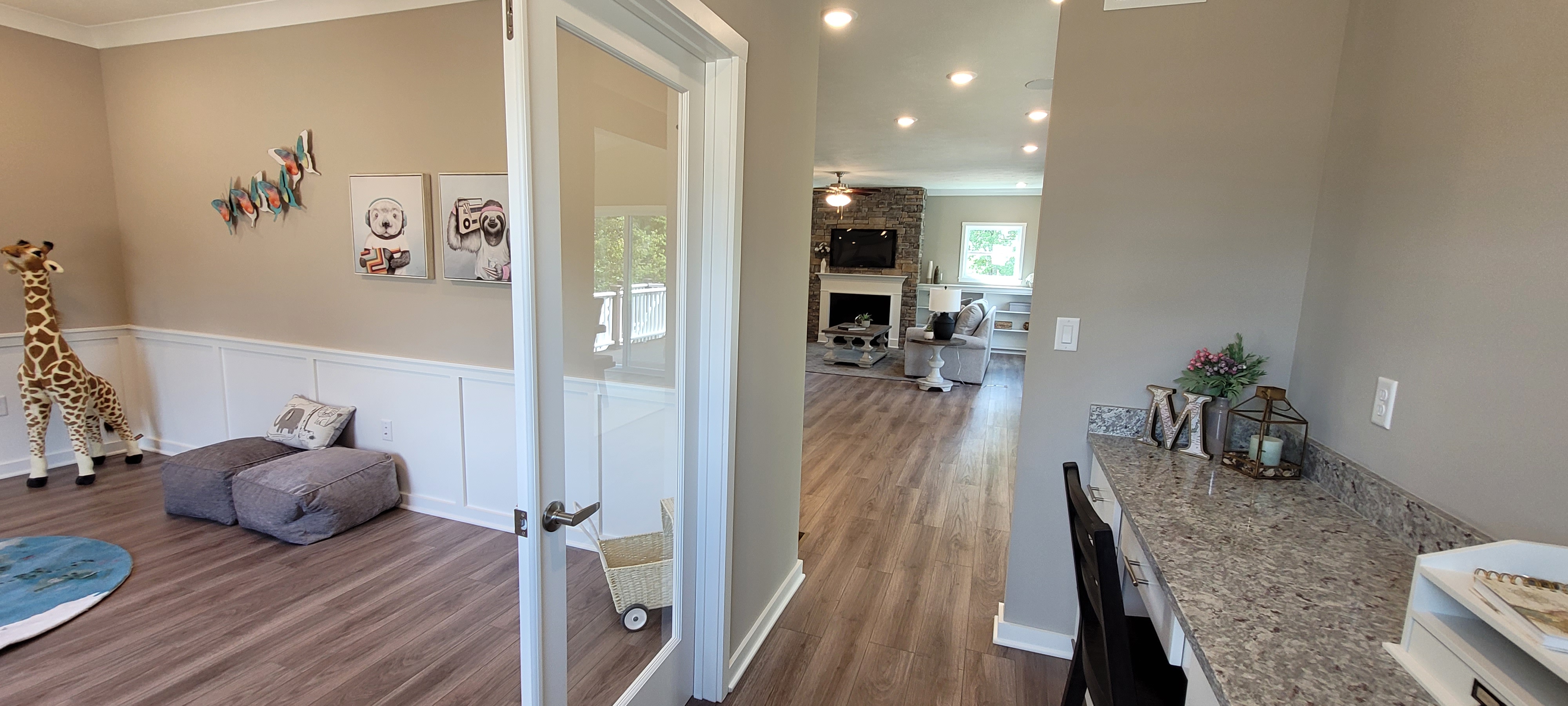 Playroom flex space leads into livingroom in a new home in Allegheny County