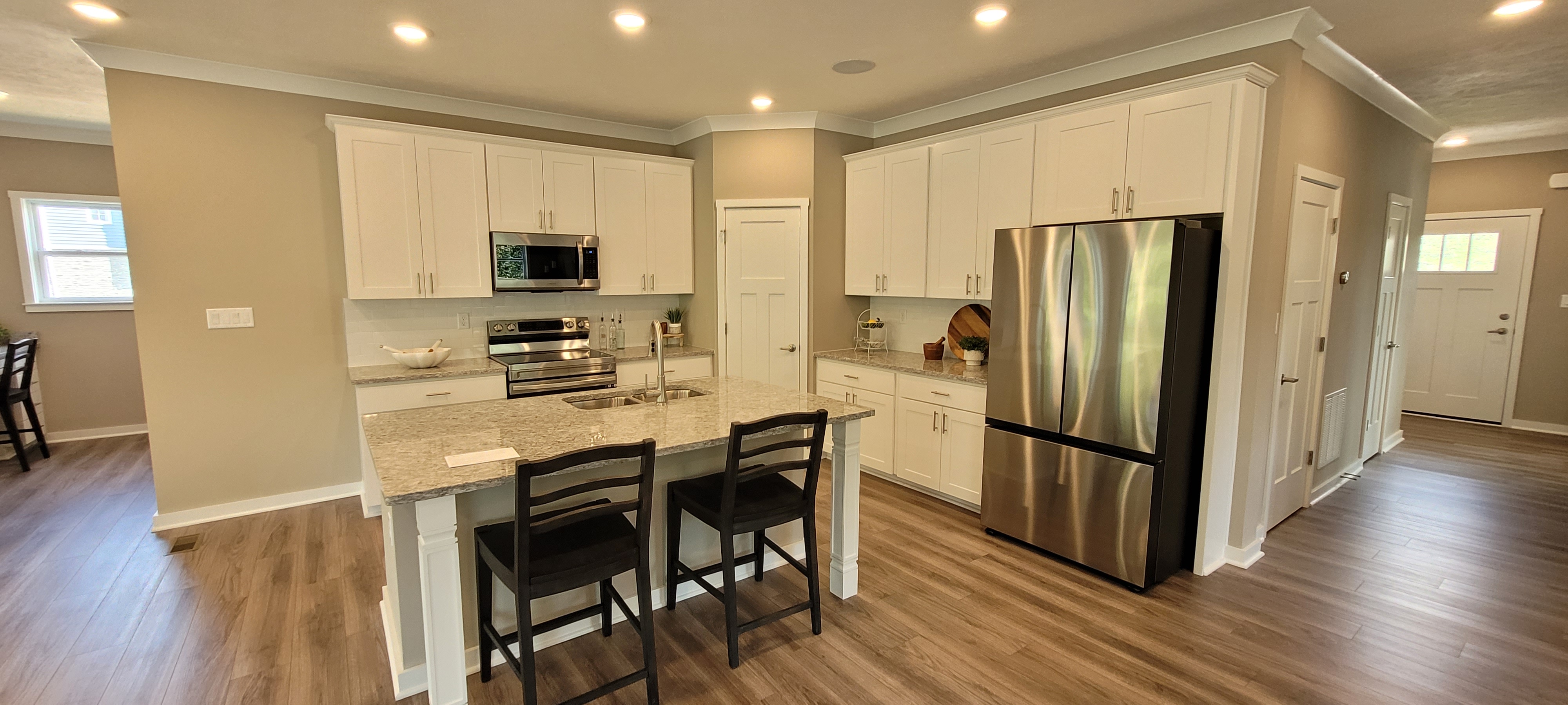 White kitchen with stainless steel appliances in Imperial, PA