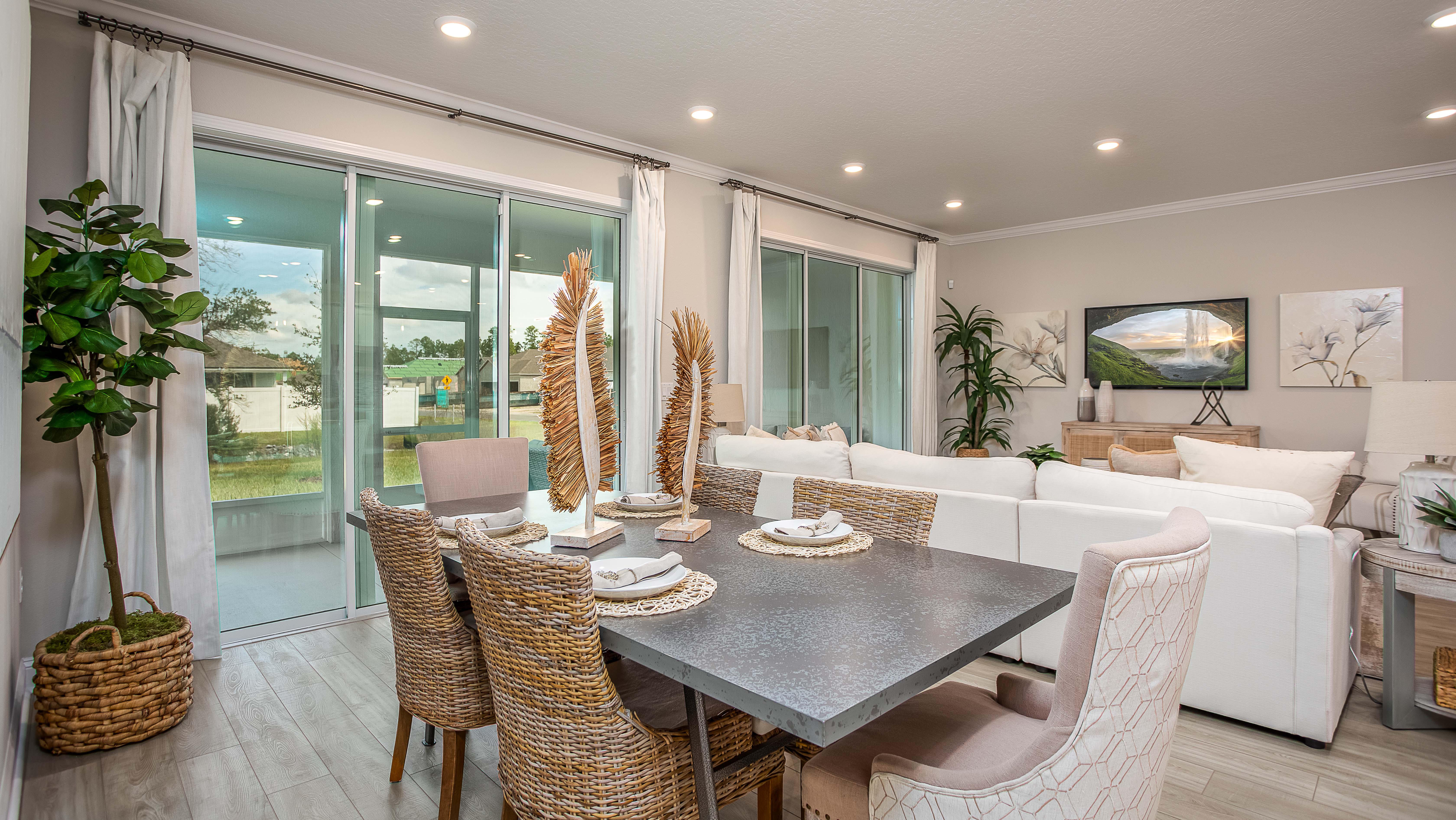 dining area of a new home in merritt island, fl with view of livingroom